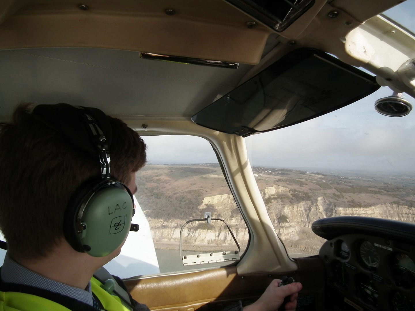 Rob Blackadder flying YW next to Fairlight cliffs - Copy